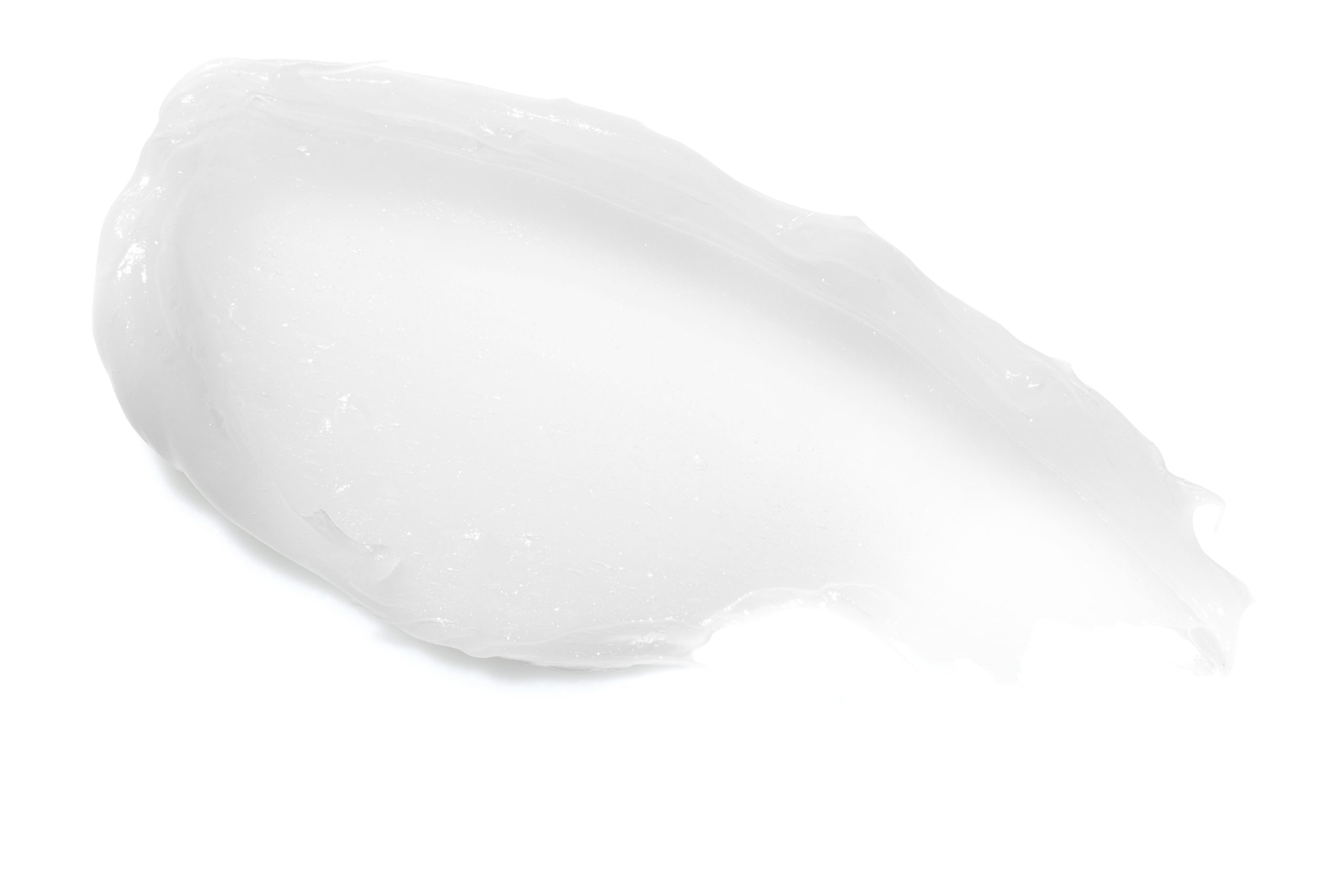 Close-up texture smear of a translucent white skincare balm